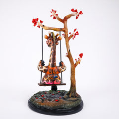 CA Tree Giraffe on Swing